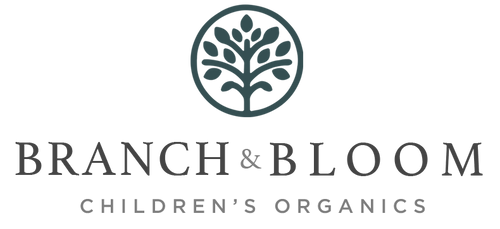 An elegant circle tree graphic top-center. Branch & Bloom children's organics logo text centered in serif font.